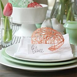 Use embroidery floss or yarn to create these colorful Easter Decorations, perfect for a place setting.