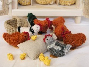 crochet chicken - it looks like some of the chicks were made yarn doll style