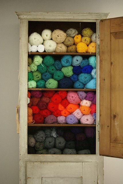 What a beautiful way to store yarn -- I would love to see this every day, waiting to be created :)
