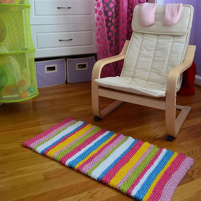 Crochet in Color: Stripey Spring Rug Instructions this rug is crazy easy!! its done in slip stitches to add bulk and a fun look. i really want to do this!