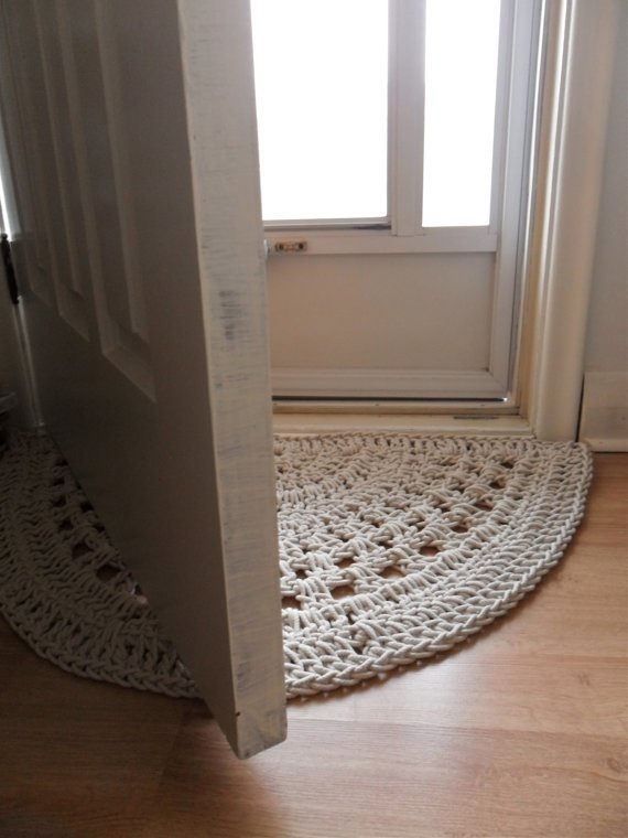 Half-moon shape crochet rug -- cream-coloured rope clothes line in a cotton / poly blend - no pattern, just picture on Etsy
